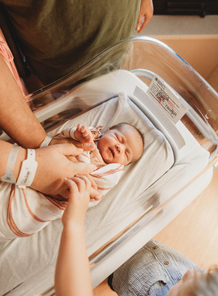 family with newborn baby at UIHC