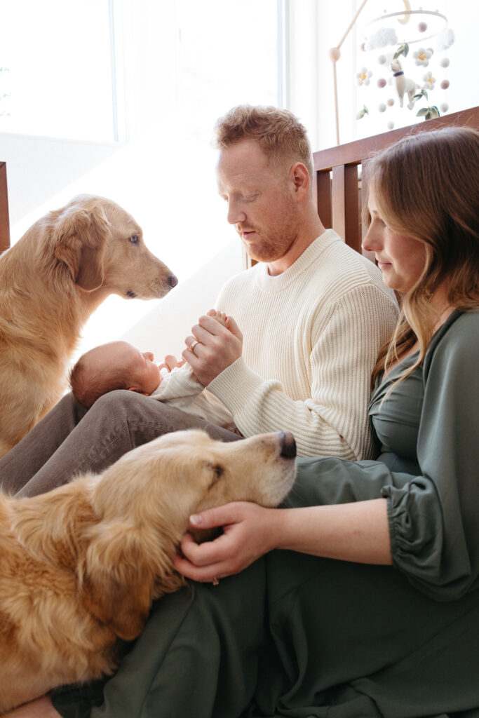 family at home with newborn in iowa city, iowa