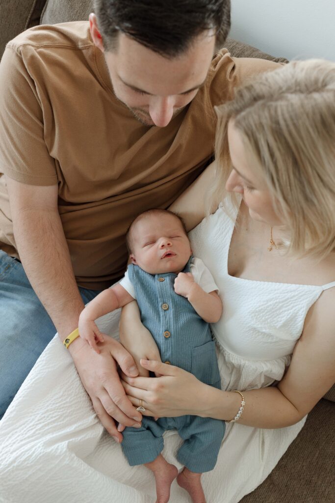 parents with baby newborn session iowa city