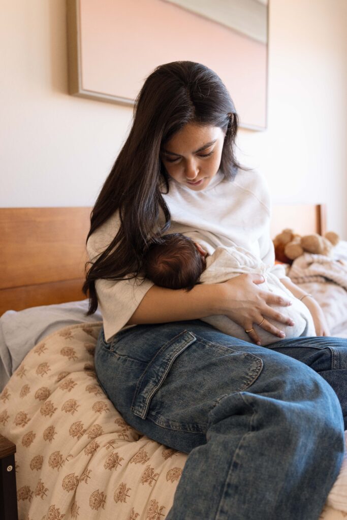 Newborn baby at home with mom
