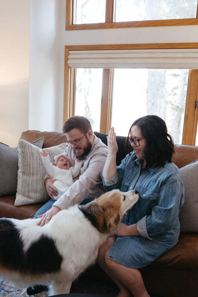 newborn baby with family