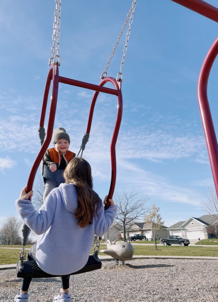 photos of kids playing at cardigan park iowa city