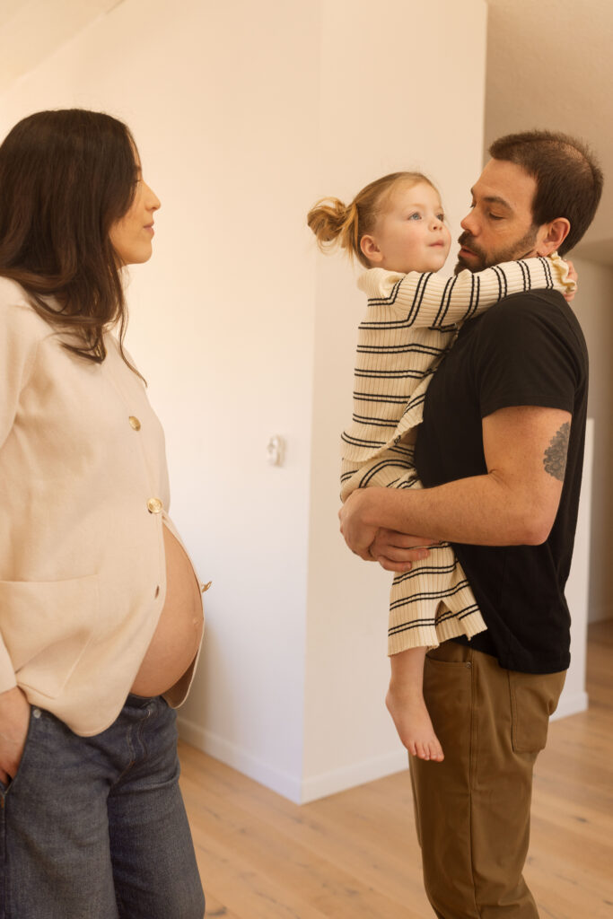 family dance party during maternity session iowa city